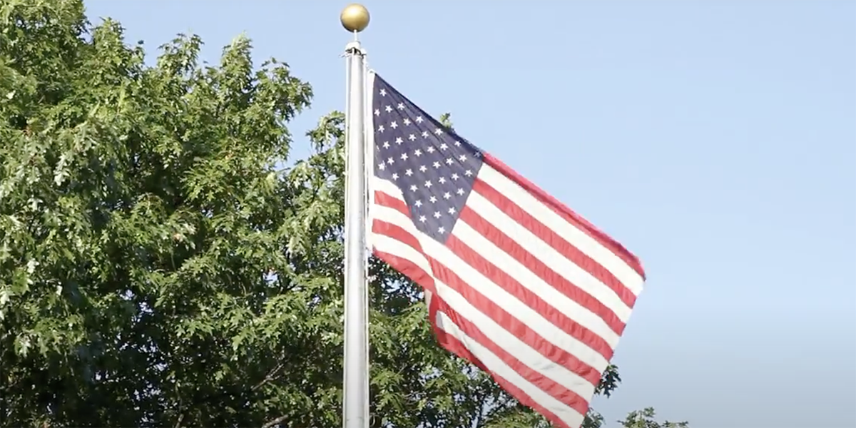 Flag pole with the United States of America flag hanging