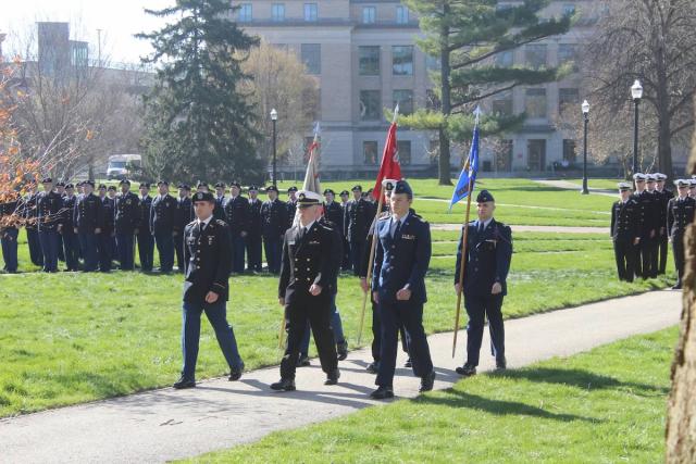 Cadets walking through campus during ceremony